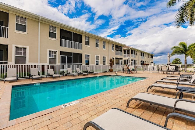 view of swimming pool featuring a patio