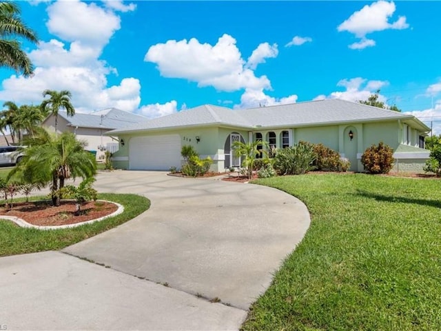 ranch-style house with a front yard and a garage