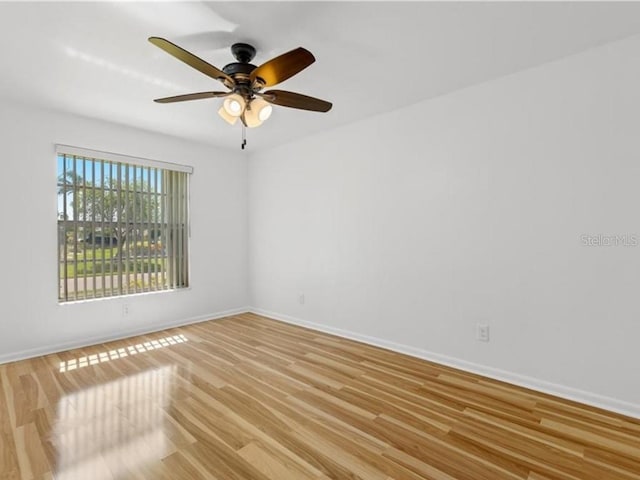 unfurnished room featuring ceiling fan and light hardwood / wood-style flooring