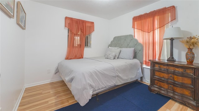 bedroom featuring hardwood / wood-style floors