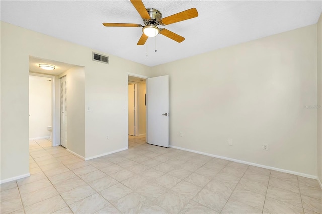 unfurnished room featuring ceiling fan