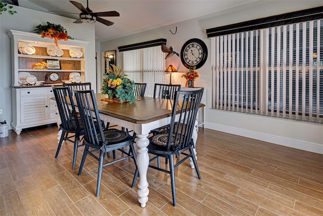 dining space featuring ceiling fan and light hardwood / wood-style flooring