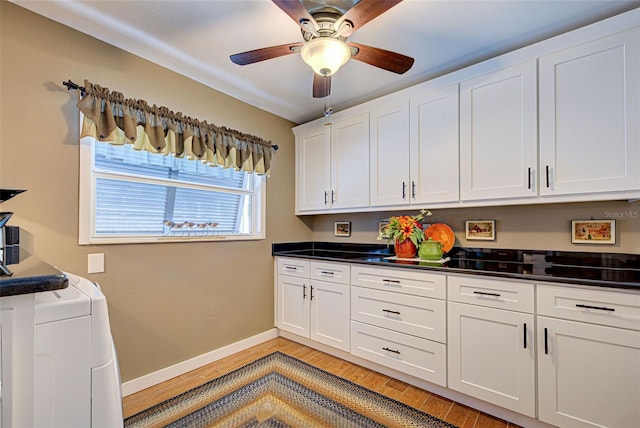 kitchen with white cabinets, light hardwood / wood-style floors, and ceiling fan