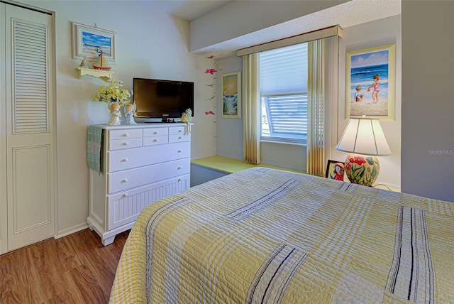 bedroom featuring light wood-type flooring