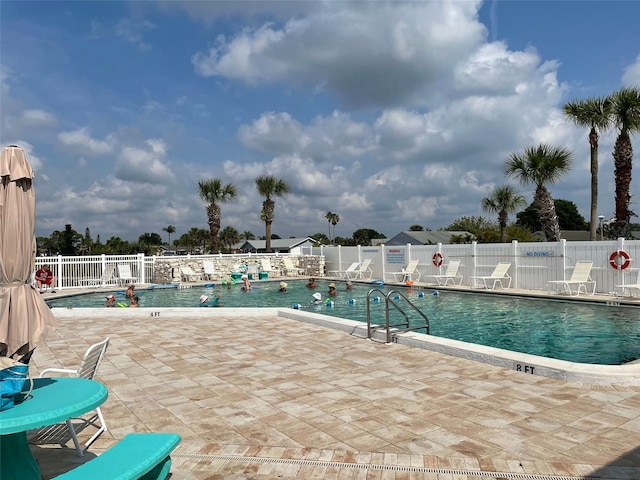 view of pool with a patio area