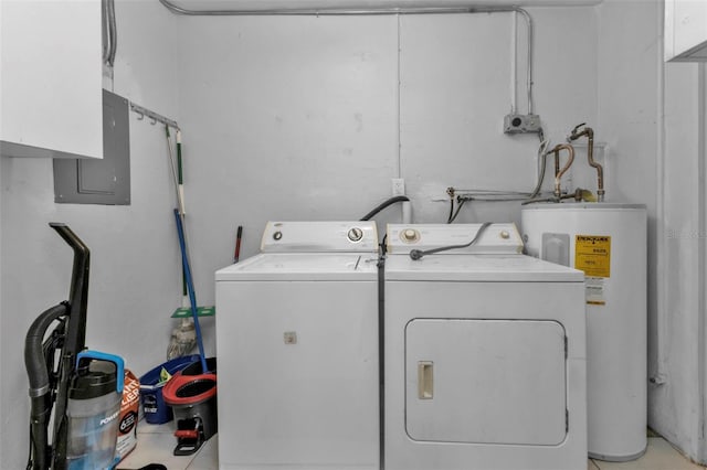 clothes washing area with washing machine and dryer and electric water heater