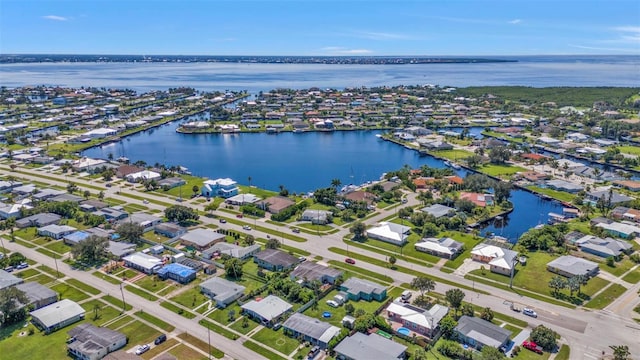 bird's eye view with a water view