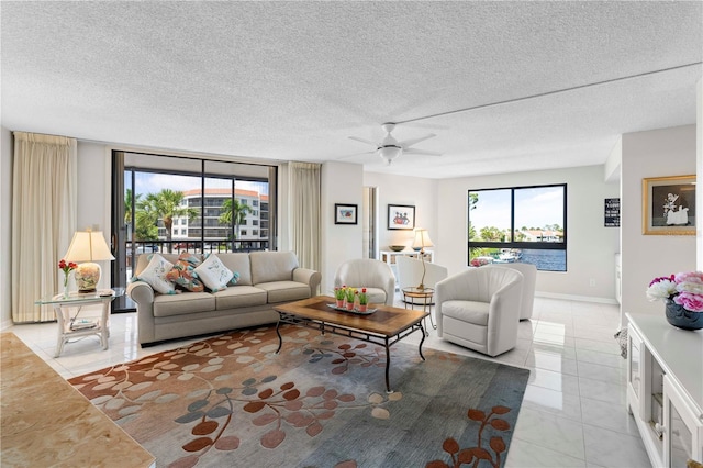 living room with a wealth of natural light and a textured ceiling