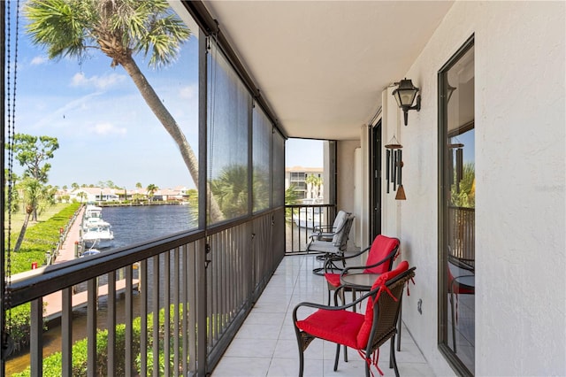 sunroom with a water view