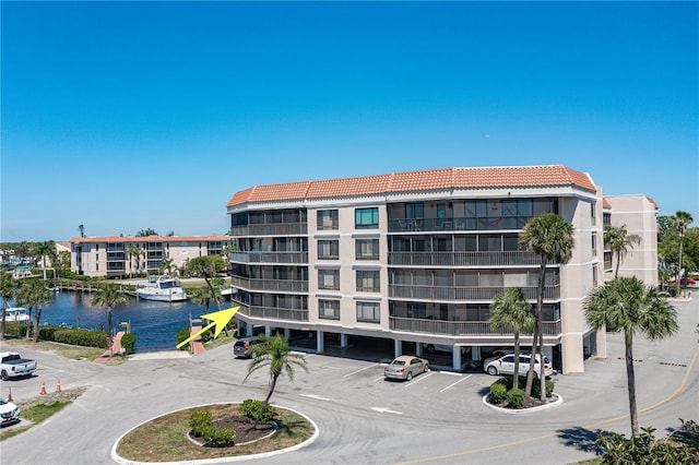 view of building exterior featuring a water view