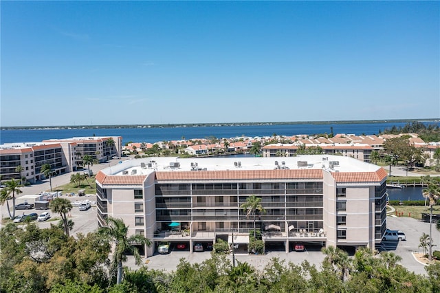 drone / aerial view featuring a water view