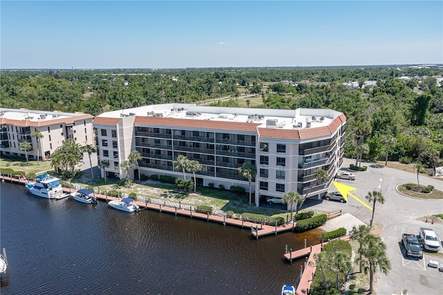 drone / aerial view with a water view