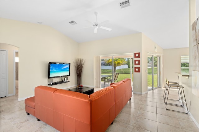 tiled living room featuring lofted ceiling and ceiling fan