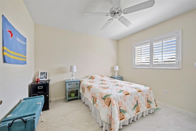 bedroom featuring ceiling fan