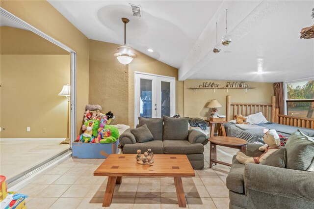 game room with lofted ceiling and light tile patterned flooring