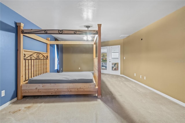 unfurnished bedroom with carpet and ceiling fan