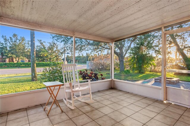 unfurnished sunroom featuring a wealth of natural light