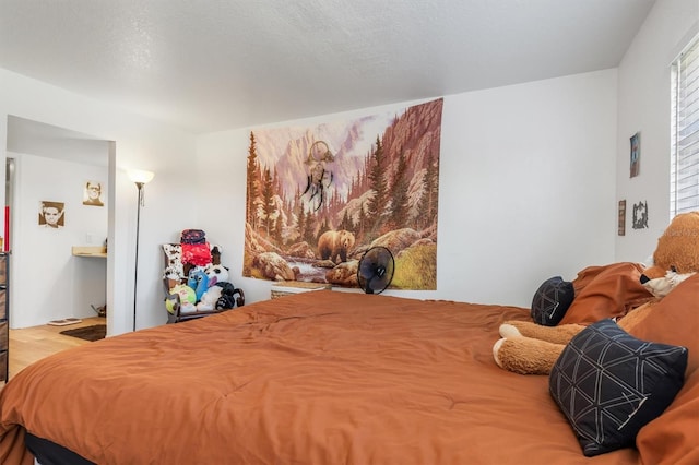 bedroom featuring hardwood / wood-style flooring