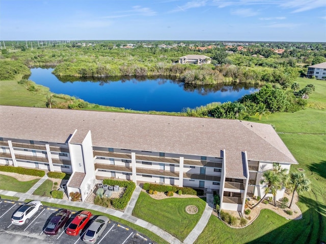 bird's eye view with a water view