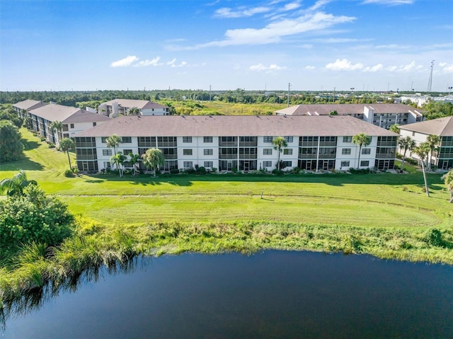 drone / aerial view with a water view