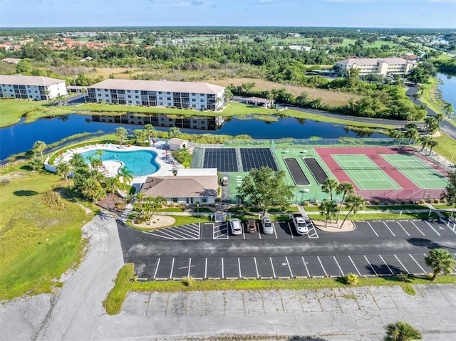 bird's eye view with a water view