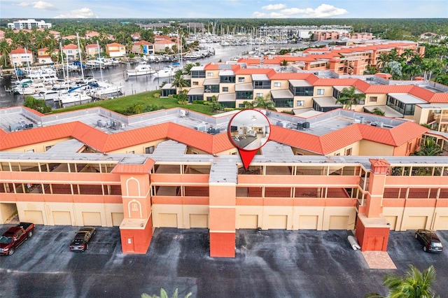 drone / aerial view featuring a water view