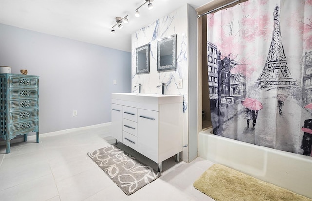 bathroom with vanity, tile patterned flooring, and shower / bathtub combination with curtain