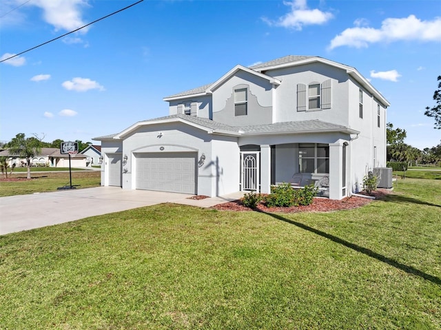 view of front of house featuring central AC, a front yard, and a garage