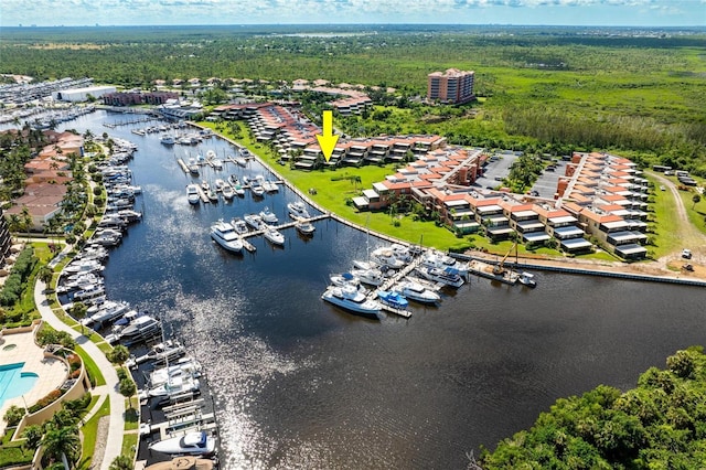 birds eye view of property featuring a water view