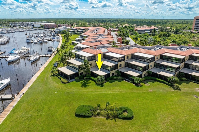 birds eye view of property featuring a water view