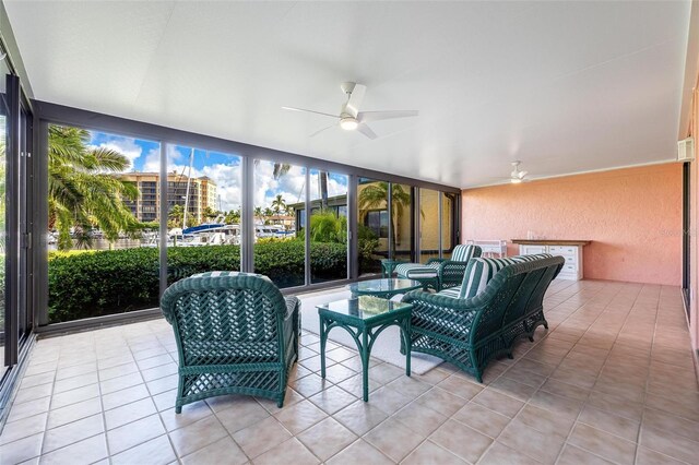 sunroom with ceiling fan