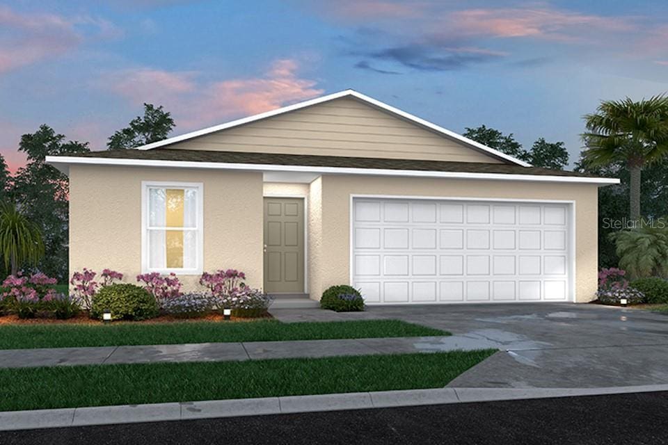 27101 N Twin Lakes Dr, Punta Gorda, FL 33955 - single story home with an attached garage, stucco siding, and concrete driveway