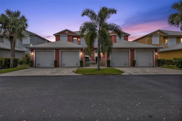 view of front of home with a garage