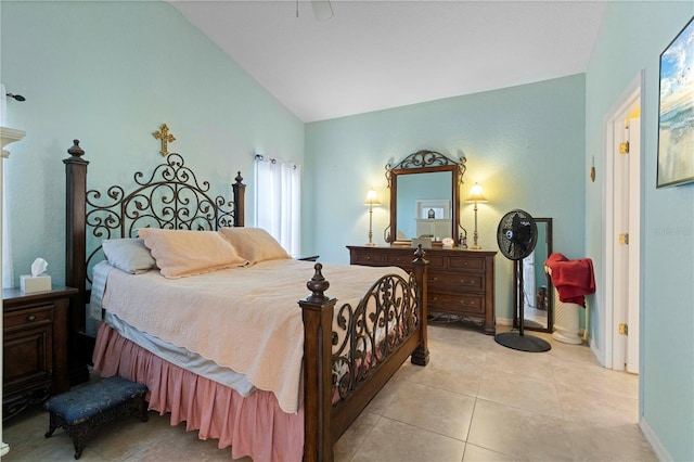 tiled bedroom with lofted ceiling