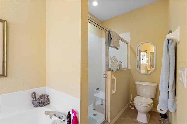 1676 Palace Ct, Punta Gorda, FL 33980 - bathroom with a stall shower, toilet, a garden tub, and tile patterned flooring
