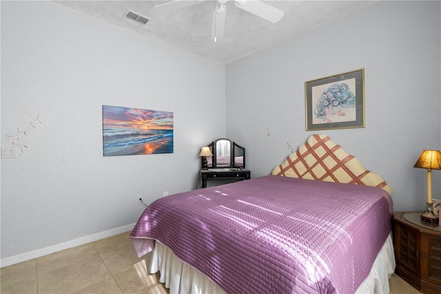 bedroom featuring light tile patterned floors and ceiling fan