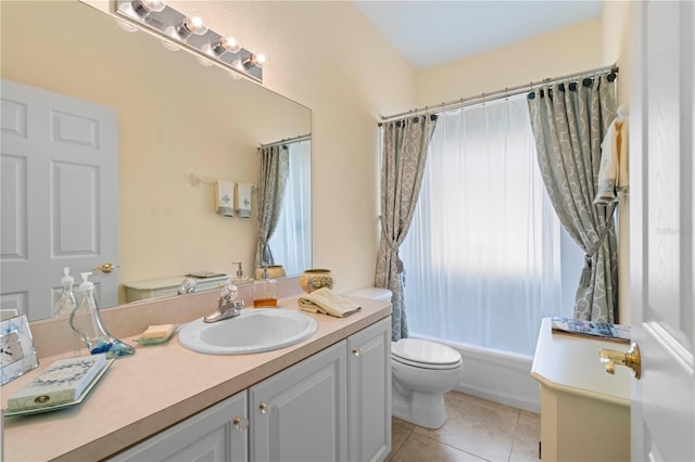 full bathroom with tile patterned flooring, vanity, toilet, and shower / bathtub combination with curtain