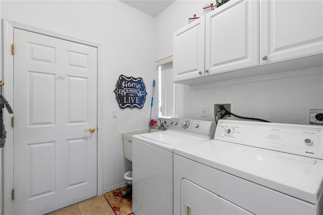 1676 Palace Ct, Punta Gorda, FL 33980 - laundry area with cabinet space, washer and clothes dryer, and light tile patterned flooring