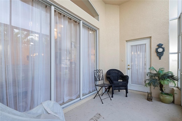 property entrance with a patio