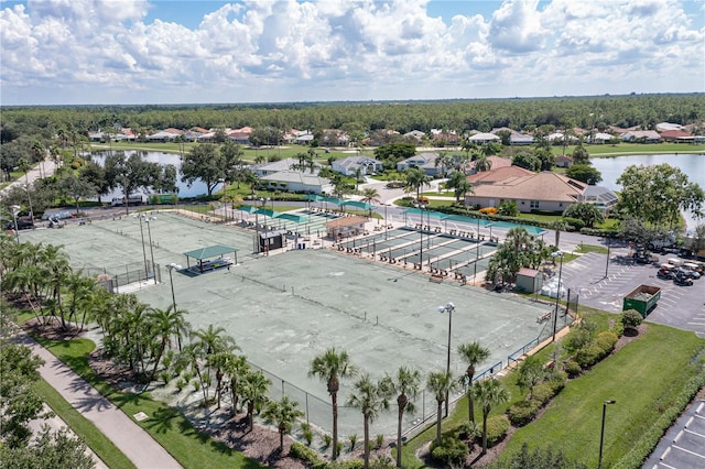 birds eye view of property featuring a water view