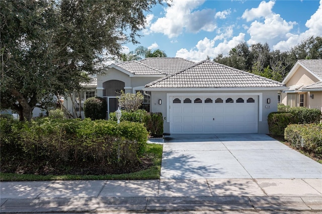 view of front of property featuring a garage