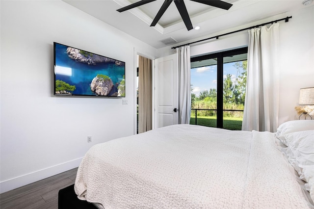 bedroom featuring dark hardwood / wood-style floors, ceiling fan, and access to exterior