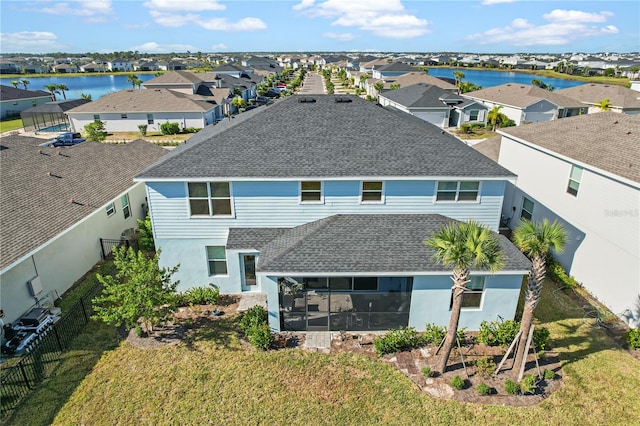 bird's eye view with a water view