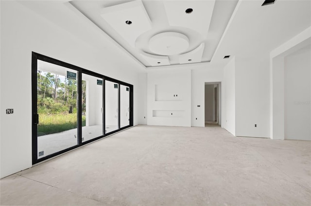 empty room with a tray ceiling