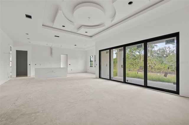 2502 Pinewood St, North Port, FL 34288 - spare room featuring healthy amount of natural light and a raised ceiling