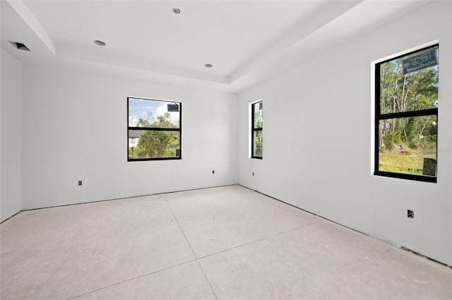 2502 Pinewood St, North Port, FL 34288 - empty room with a raised ceiling