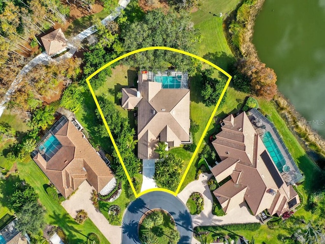 birds eye view of property featuring a water view