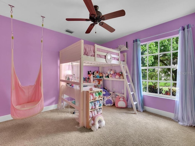 bedroom featuring ceiling fan and carpet floors