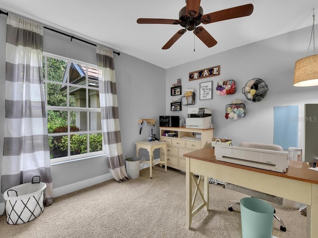 office with ceiling fan, plenty of natural light, and carpet