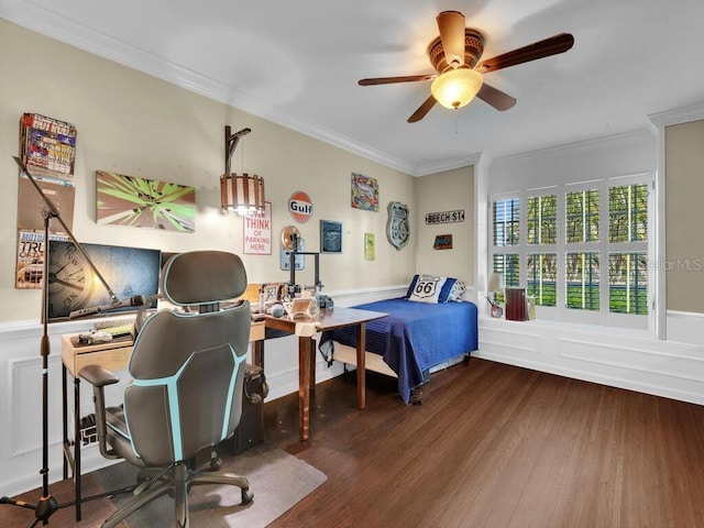 bedroom with ornamental molding, dark hardwood / wood-style flooring, and ceiling fan